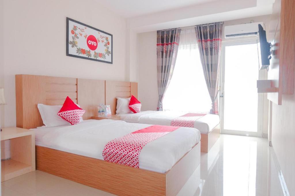Oyo 696 Hasanah Guest House Syariah De Saphire Malang Buitenkant foto